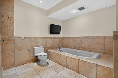 4 Norris Coulee Loop, De Winton, AB 