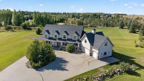 4 Norris Coulee Loop, De Winton, AB 