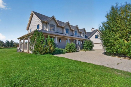 4 Norris Coulee Loop, De Winton, AB 