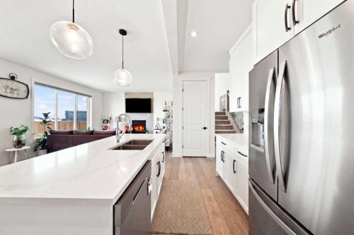 170 Chelsea Road, Chestermere, AB - Indoor Photo Showing Kitchen With Stainless Steel Kitchen With Double Sink With Upgraded Kitchen
