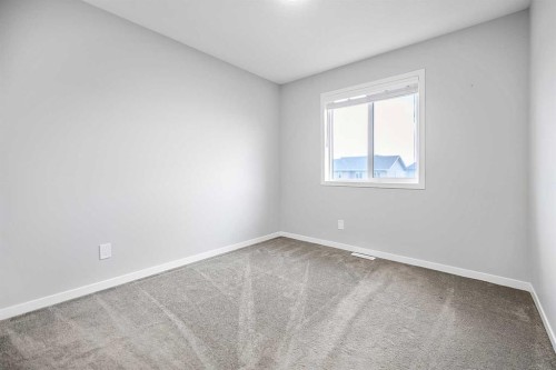 68 Wolf Gate, Okotoks, AB 