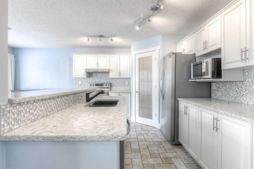 412 Springbank Place Sw, Calgary, AB 