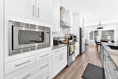 528 Belmont Heath Sw, Calgary, AB 