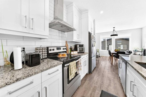 528 Belmont Heath Sw, Calgary, AB 