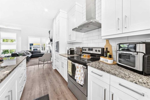 528 Belmont Heath Sw, Calgary, AB 