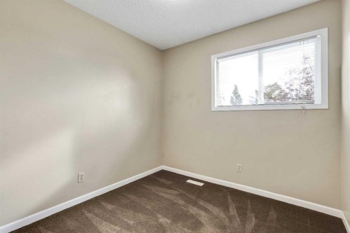 105-107 Elm Place, Okotoks, AB 