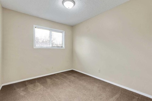 105-107 Elm Place, Okotoks, AB 