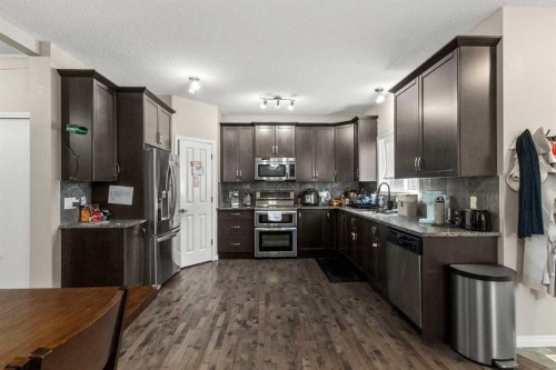 10 Nolanfield Heights Nw, Calgary, AB - Indoor Photo Showing Kitchen With Upgraded Kitchen