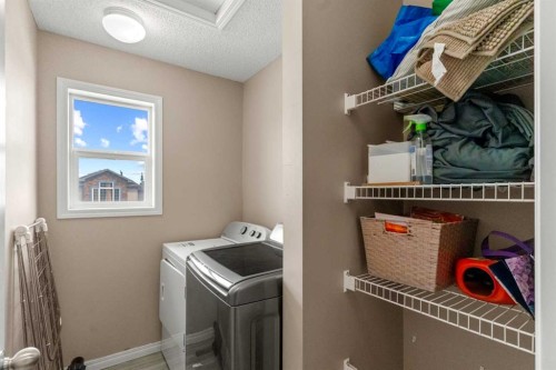 10 Nolanfield Heights Nw, Calgary, AB - Indoor Photo Showing Laundry Room