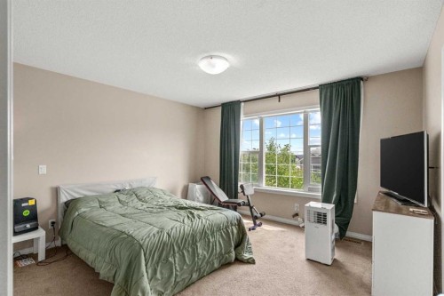 10 Nolanfield Heights Nw, Calgary, AB - Indoor Photo Showing Bedroom