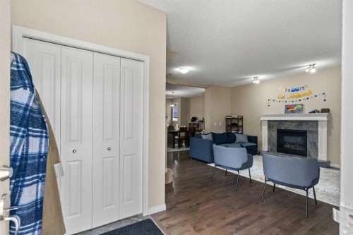 10 Nolanfield Heights Nw, Calgary, AB - Indoor With Fireplace