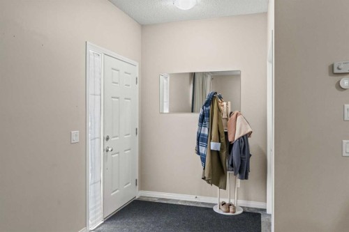 10 Nolanfield Heights Nw, Calgary, AB - Indoor Photo Showing Other Room