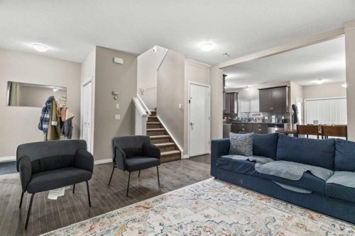 10 Nolanfield Heights Nw, Calgary, AB - Indoor Photo Showing Living Room