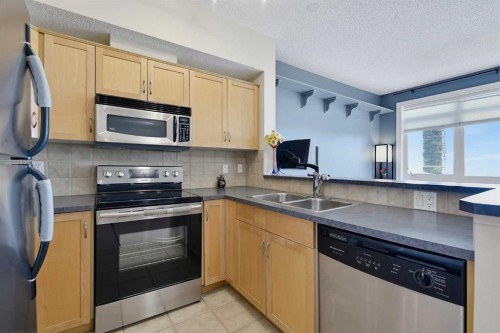 4-117 Rockyledge View Nw, Calgary, AB 