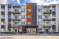 106-360 Harvest Hills Way NE Calgary, AB T3K 2S1