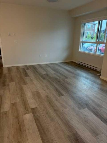 106-360 Harvest Hills Way Ne, Calgary, AB 