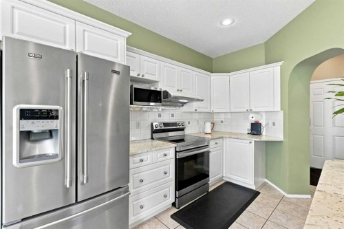 113 Rocky Ridge Point Nw, Calgary, AB 