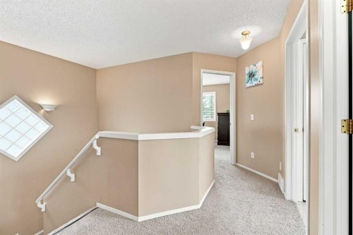 113 Rocky Ridge Point Nw, Calgary, AB 
