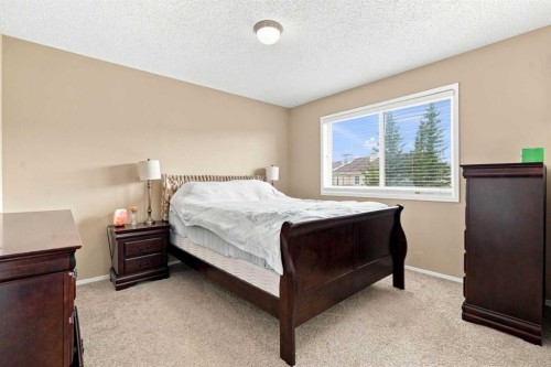 113 Rocky Ridge Point Nw, Calgary, AB 