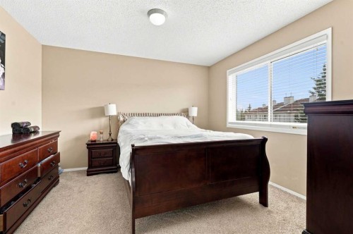 113 Rocky Ridge Point Nw, Calgary, AB 