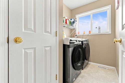 113 Rocky Ridge Point Nw, Calgary, AB 