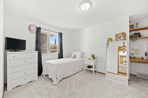 315 Rocky Ridge Bay Nw, Calgary, AB 