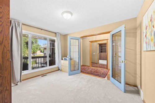 315 Rocky Ridge Bay Nw, Calgary, AB 