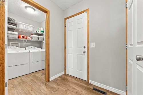 2 Cimarron Grove Bay, Okotoks, AB 