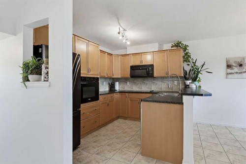 23 Tucker Circle, Okotoks, AB 