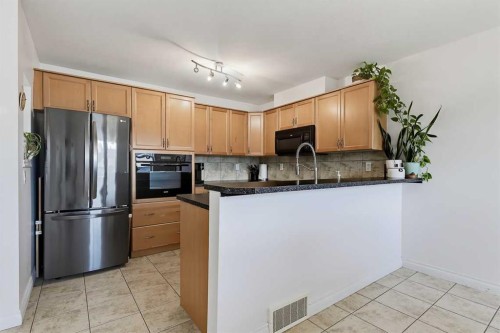 23 Tucker Circle, Okotoks, AB 