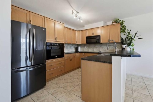 23 Tucker Circle, Okotoks, AB 