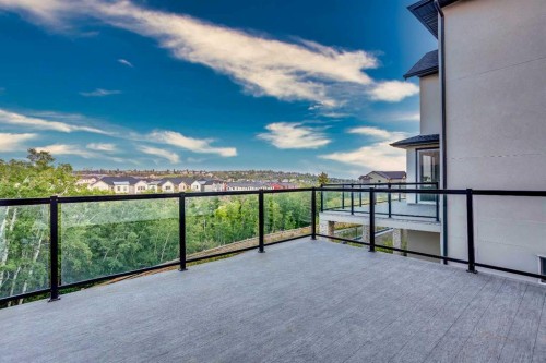 32 Spring Creek Point Sw, Calgary, AB 