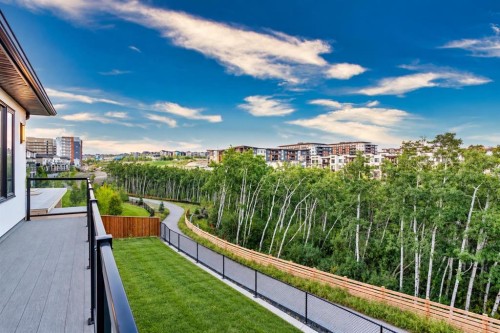 32 Spring Creek Point Sw, Calgary, AB 