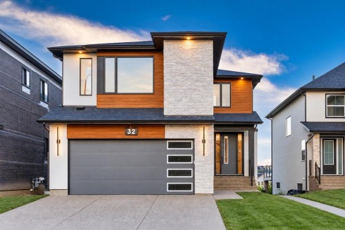 32 Spring Creek Point Sw, Calgary, AB 