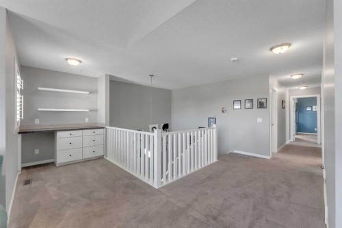 353 Kinniburgh Boulevard, Chestermere, AB - Indoor Photo Showing Other Room