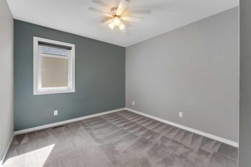 353 Kinniburgh Boulevard, Chestermere, AB - Indoor Photo Showing Other Room