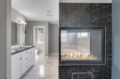 353 Kinniburgh Boulevard, Chestermere, AB - Indoor Photo Showing Bathroom