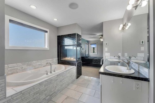 353 Kinniburgh Boulevard, Chestermere, AB - Indoor Photo Showing Bathroom