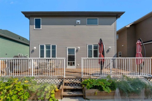 353 Kinniburgh Boulevard, Chestermere, AB - Outdoor With Deck Patio Veranda With Exterior