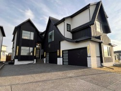 16 Rockcliff Hill NW Calgary, AB T3G 0G6
