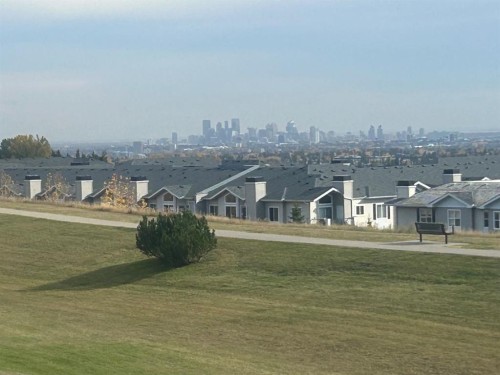 215 Rocky Ridge Drive Nw, Calgary, AB 